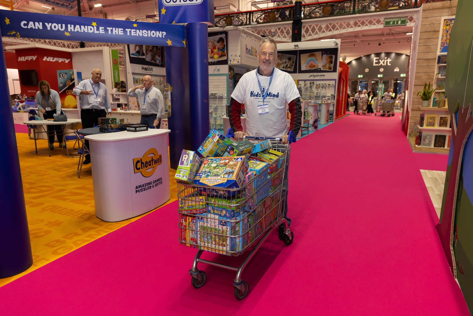 Man with cart full of items